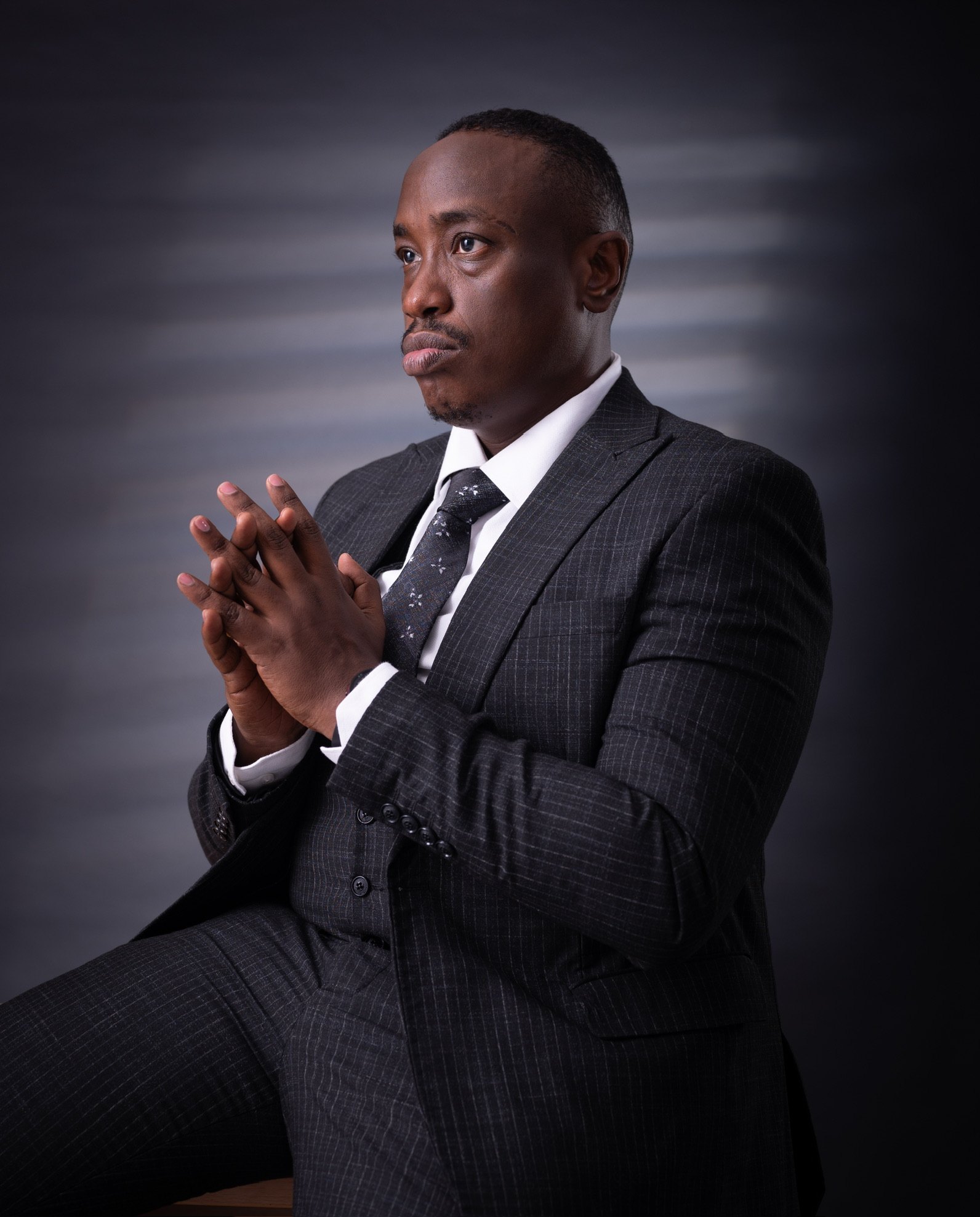Pastor David Lai — dramatic studio portrait